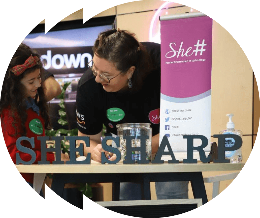 She Sharp team members at an event